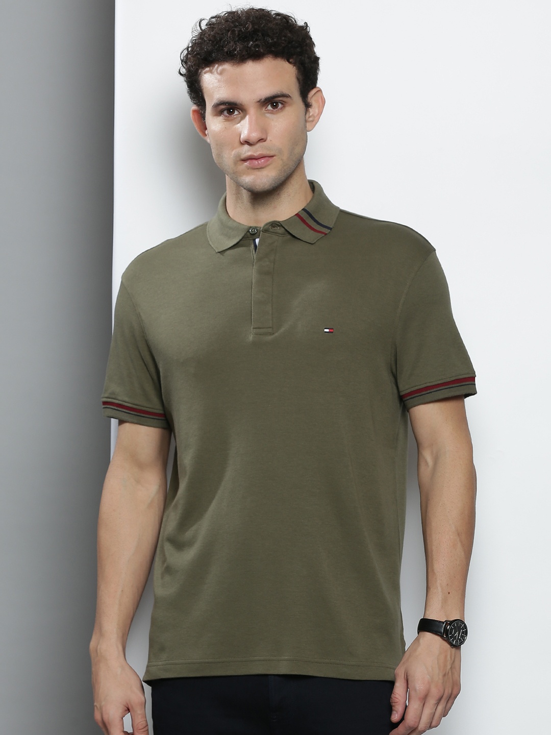 

Tommy Hilfiger Men Olive Green Solid Polo Collar T-shirt