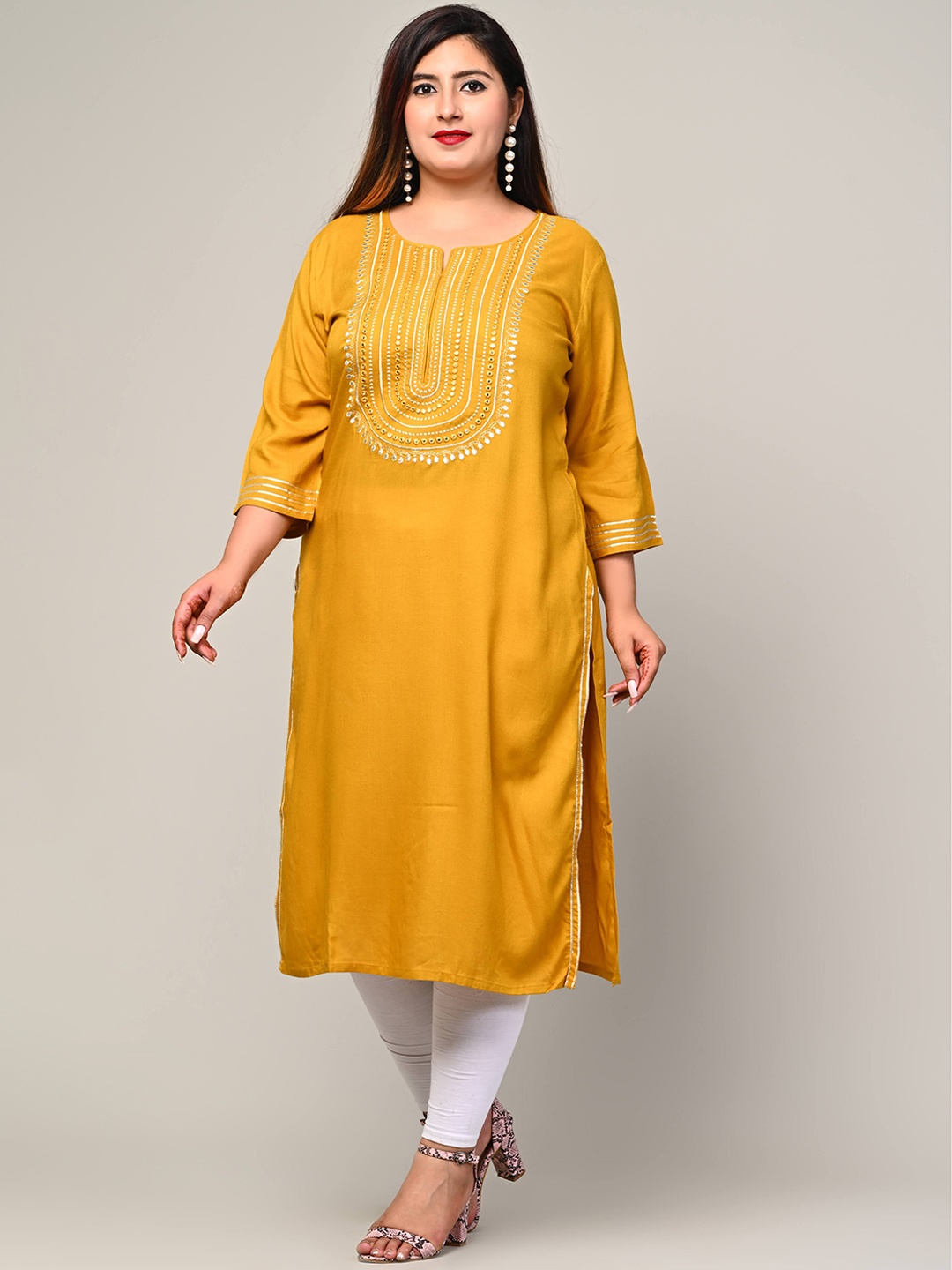 

Swasti Women Mustard Yellow Printed Flared Sleeves Floral Kurta