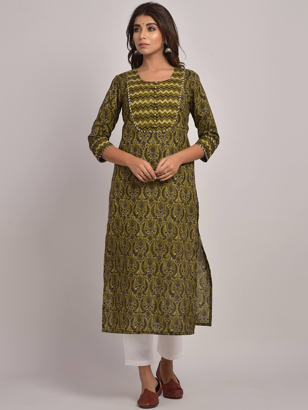 

Swasti Women Green Ethnic Motifs Printed Mirror Work Floral Kurta