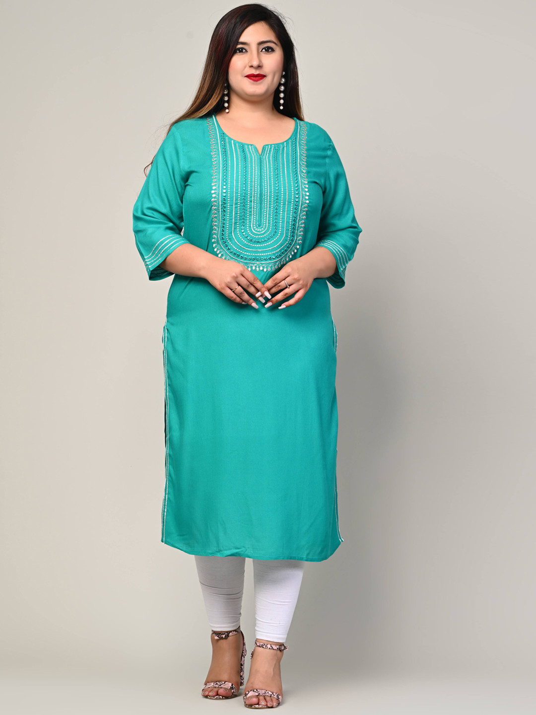 

Swasti Women Turquoise Blue Geometric Flared Sleeves Floral Kurta