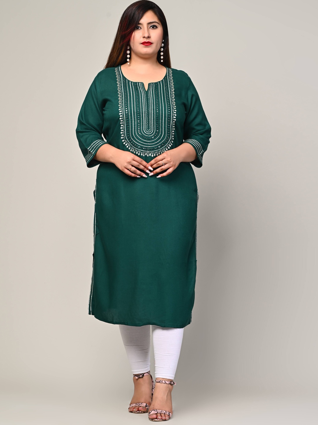 

Swasti Women Green Yoke Design Thread Work Floral Kurta