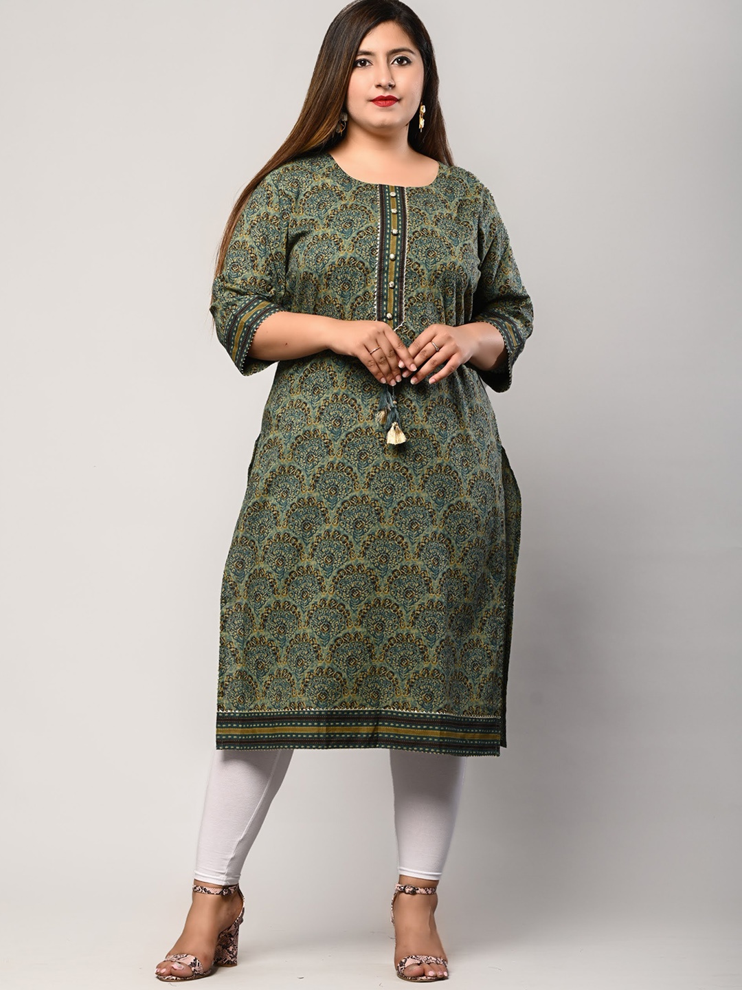 

Swasti Women Green Ethnic Motifs Thread Work Floral Kurta