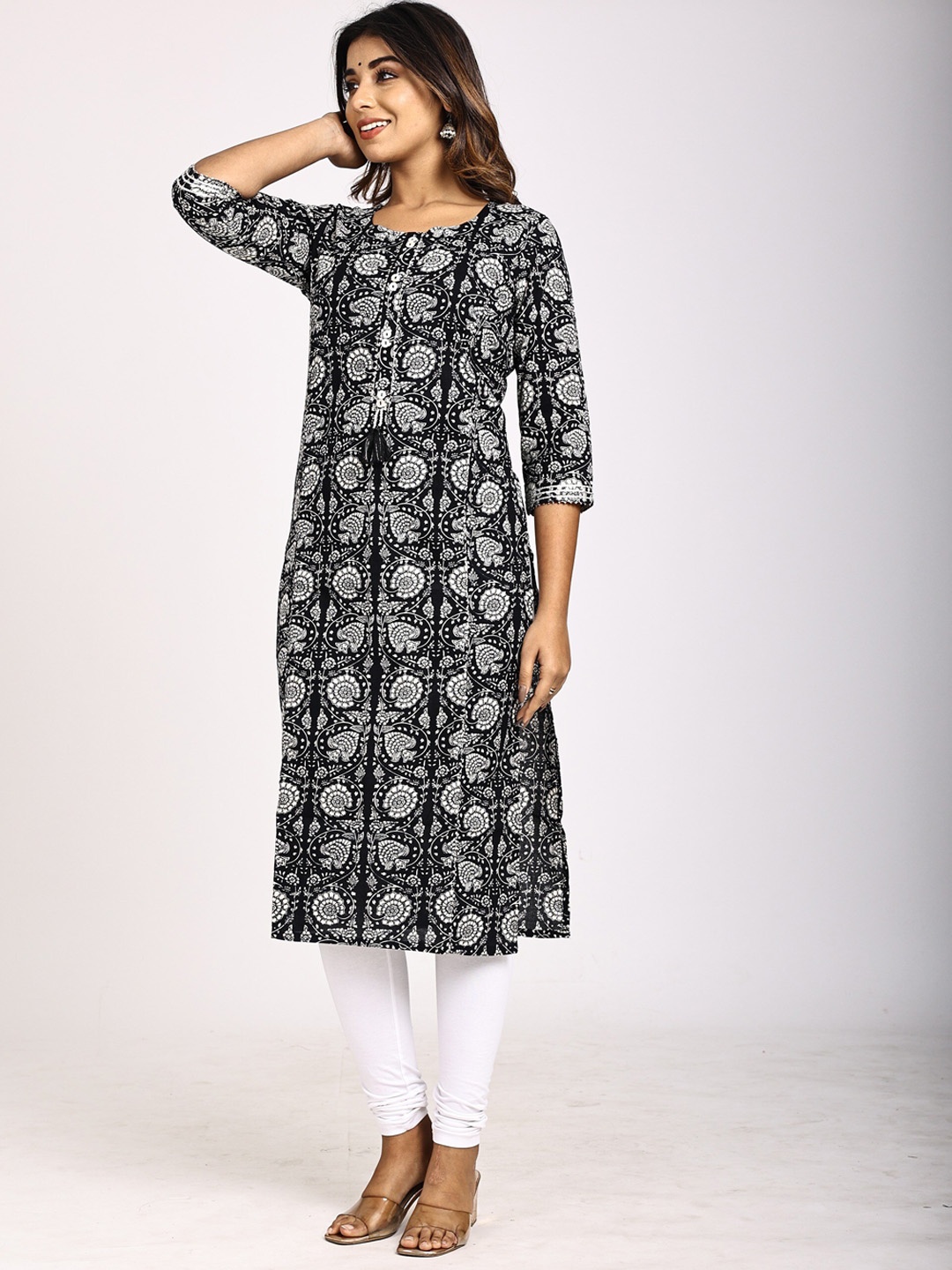 

Swasti Women Black Ethnic Motifs Printed Thread Work Floral Kurta
