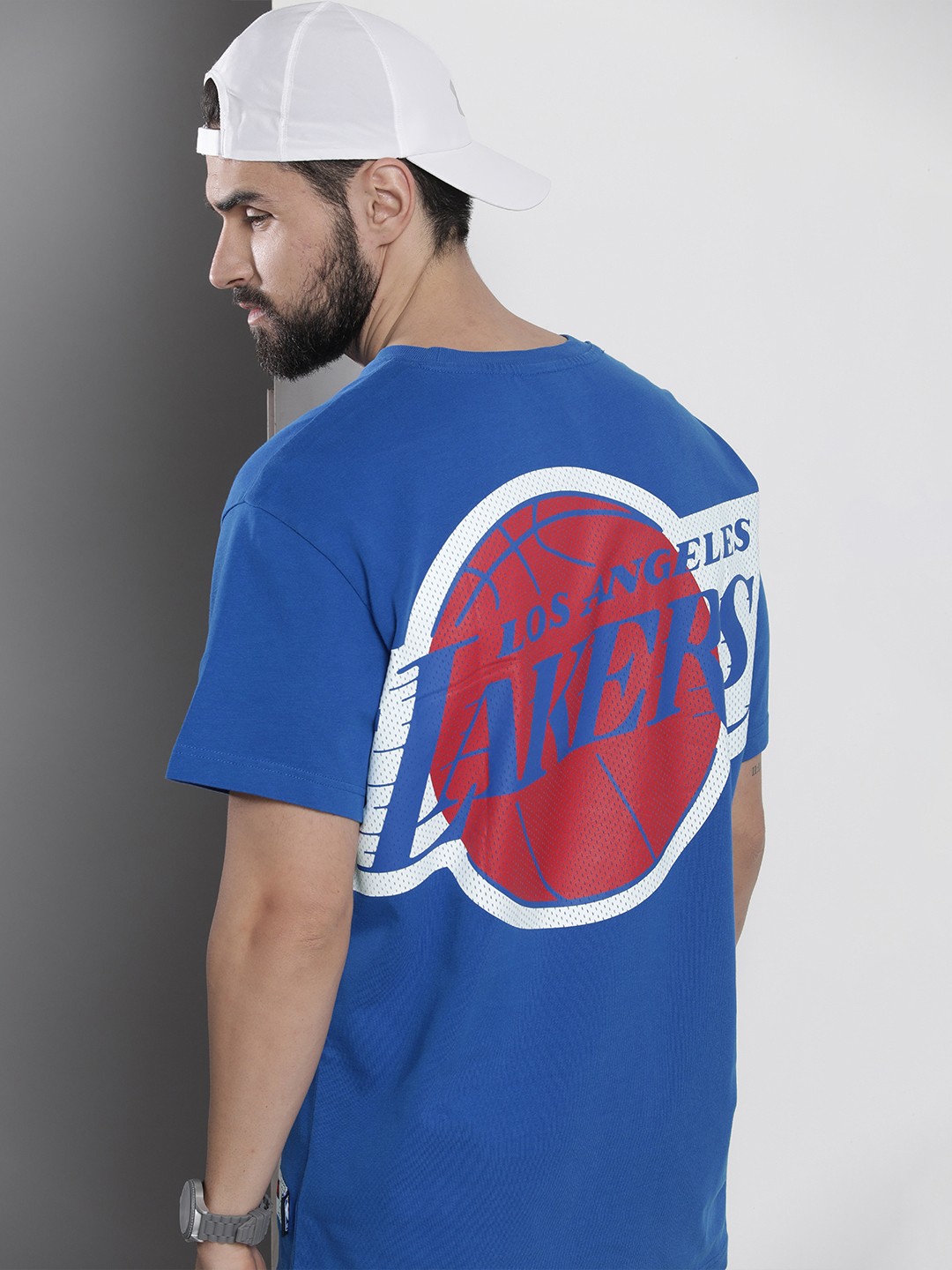 

Tommy Hilfiger Men Blue & Red Brand Logo Printed Pure Cotton T-shirt