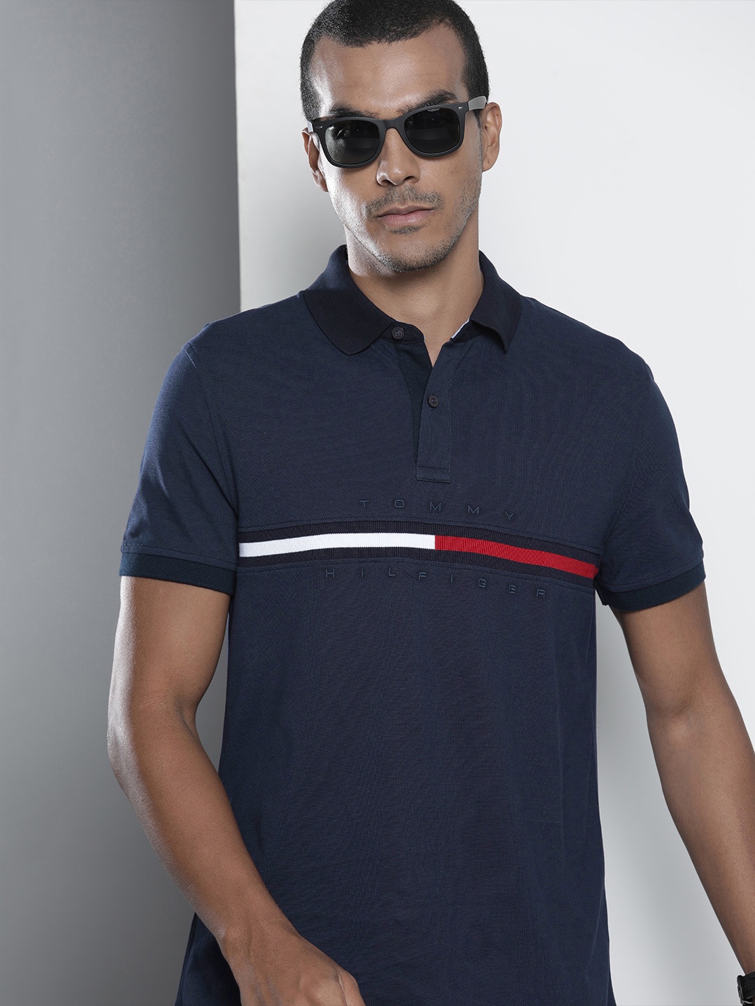 

Tommy Hilfiger Men Navy Blue & Red Striped Polo Collar T-shirt