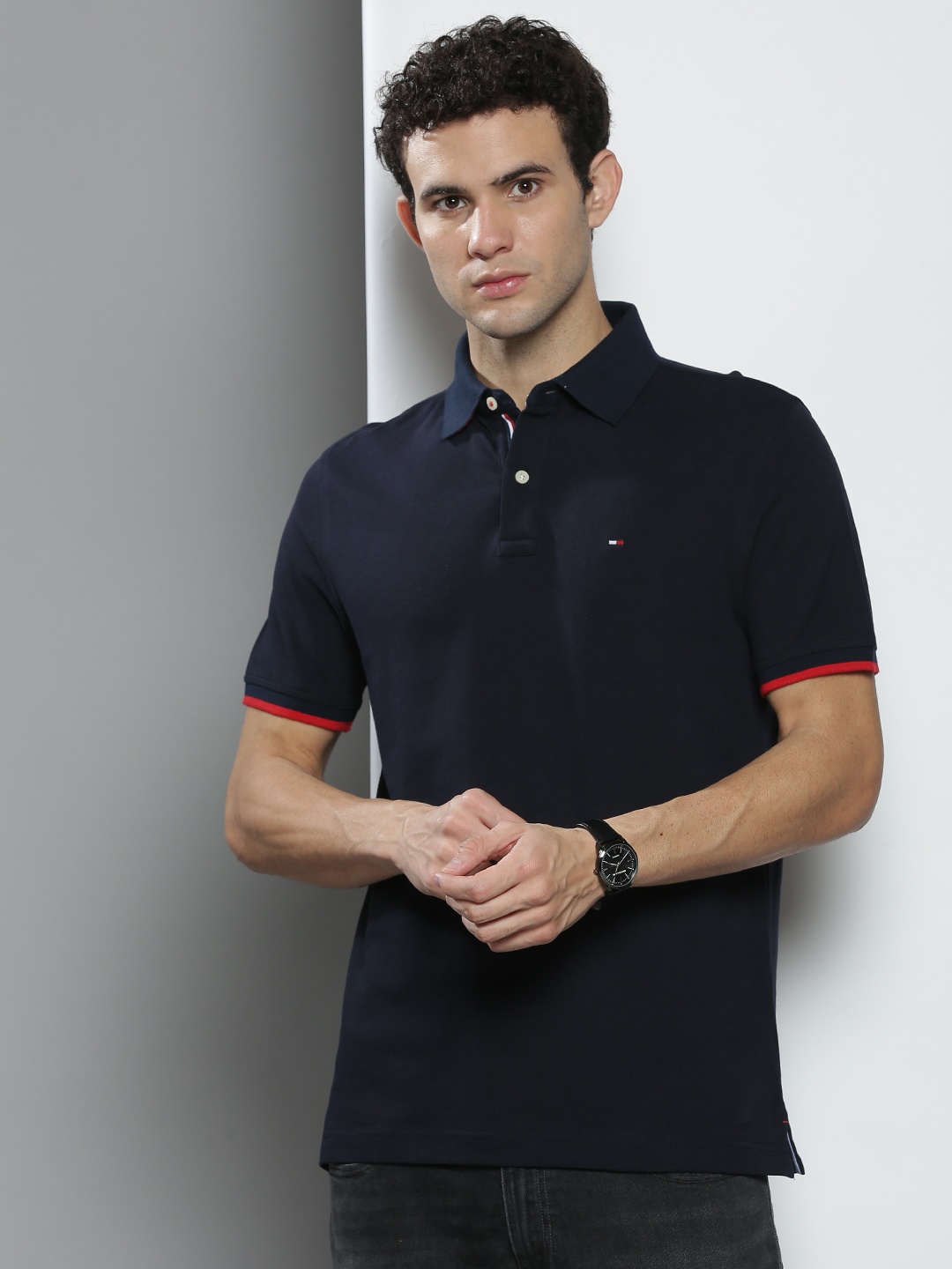 

Tommy Hilfiger Men Navy Blue Solid Cotton Polo Collar T-shirt
