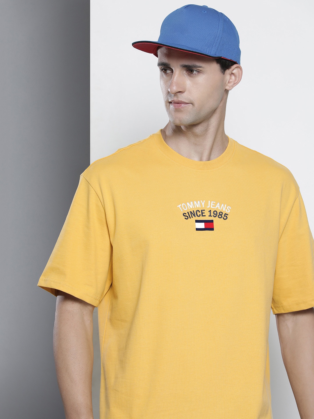 

Tommy Hilfiger Men Yellow Brand Logo Printed Pure Cotton Boxy T-shirt