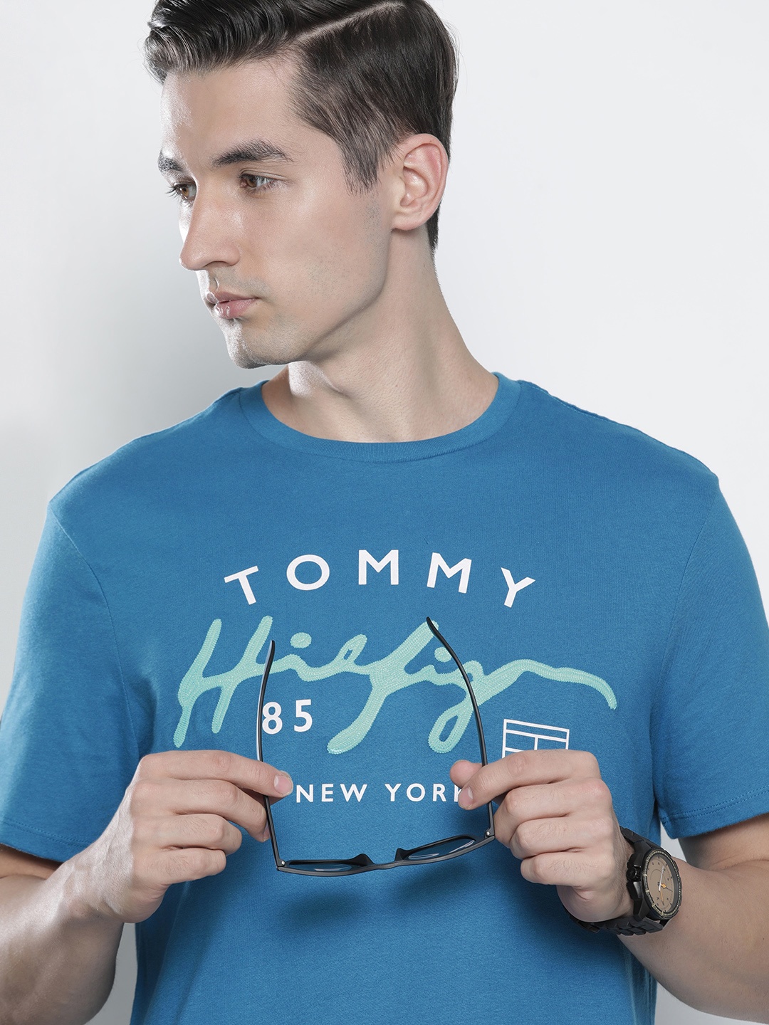 

Tommy Hilfiger Men Blue Applique Typography Printed Pure Cotton Casual T-shirt