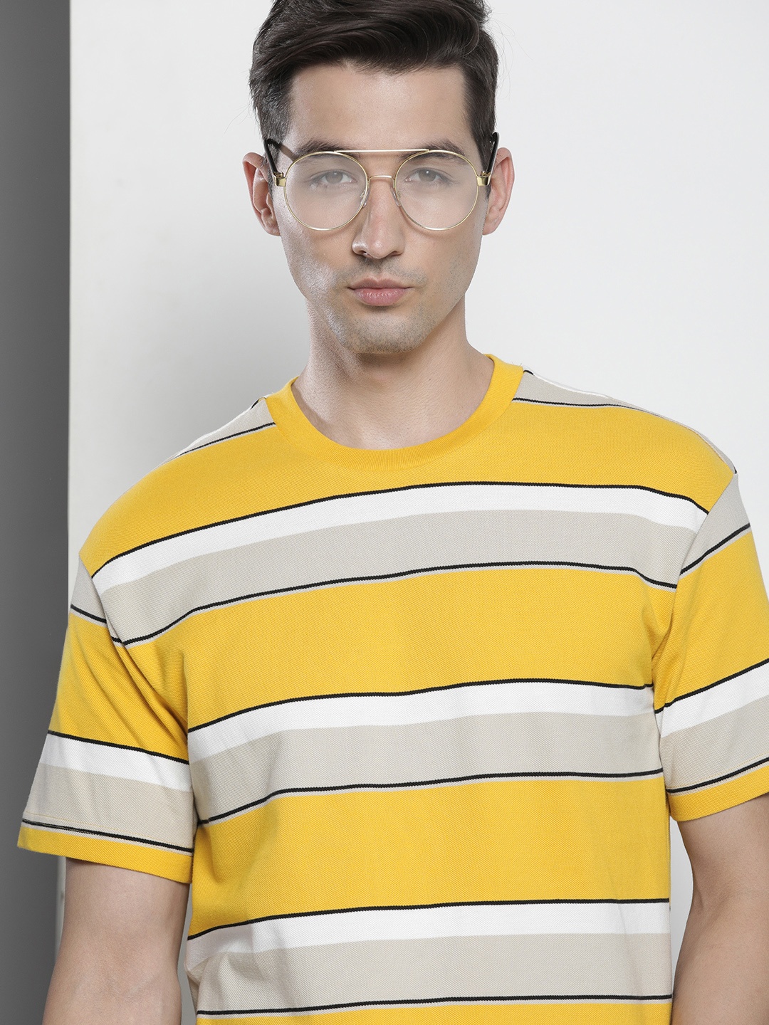

Tommy Hilfiger Men Yellow & Beige Striped Organic Cotton Relaxed Fit T-shirt