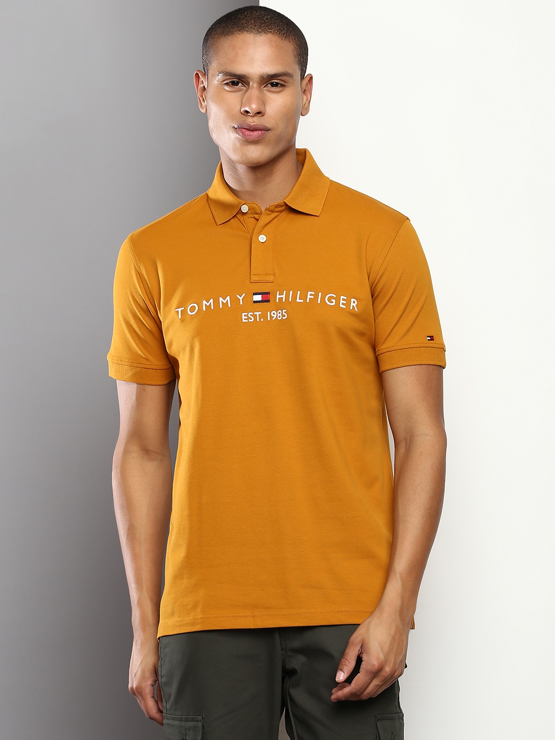 

Tommy Hilfiger Men Brand Logo Polo Collar T-shirt, Mustard