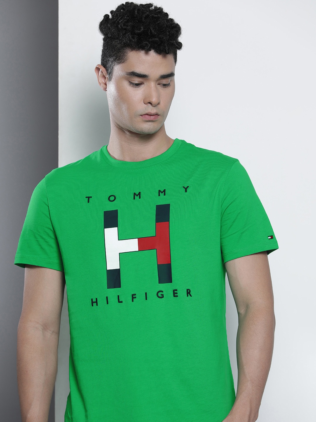 

Tommy Hilfiger Men Green & Black Brand Logo Printed Pure Cotton T-shirt
