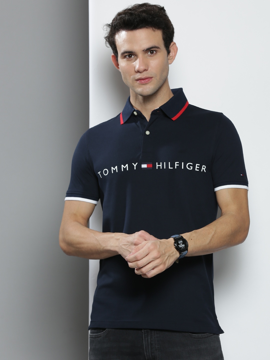 

Tommy Hilfiger Men Navy Blue & White Brand Logo Printed Polo Collar T-shirt