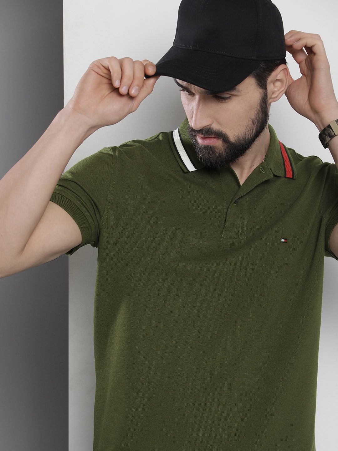 

Tommy Hilfiger Men Olive Green Self Designed Polo Collar Casual T-shirt