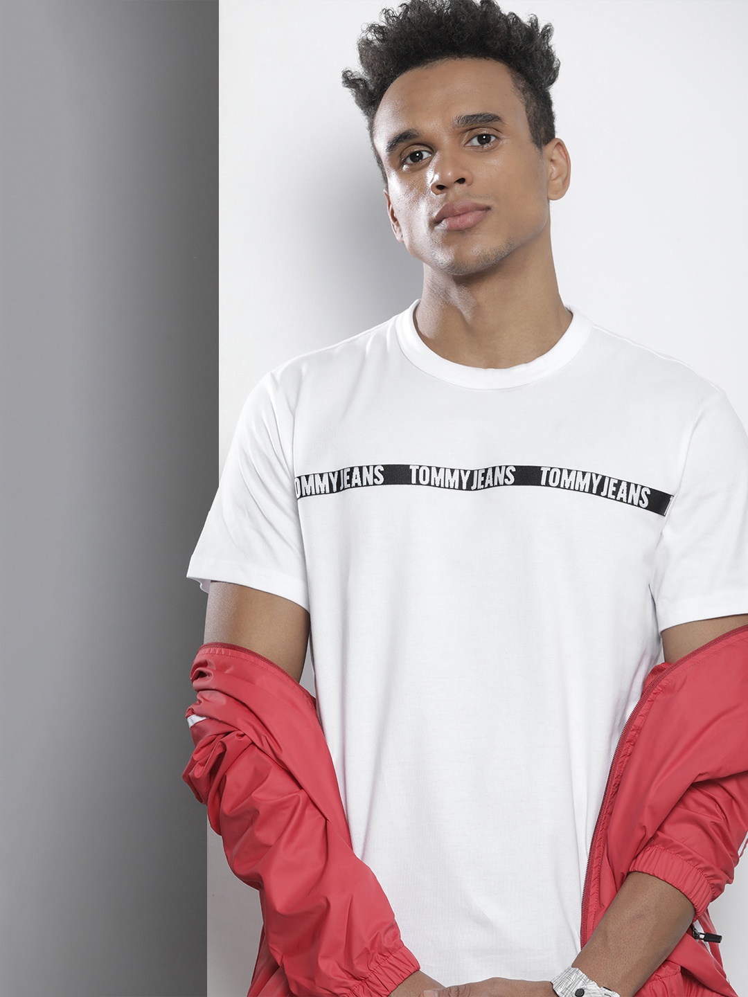 

Tommy Hilfiger Men White Typography Applique Pure Cotton Casual T-shirt