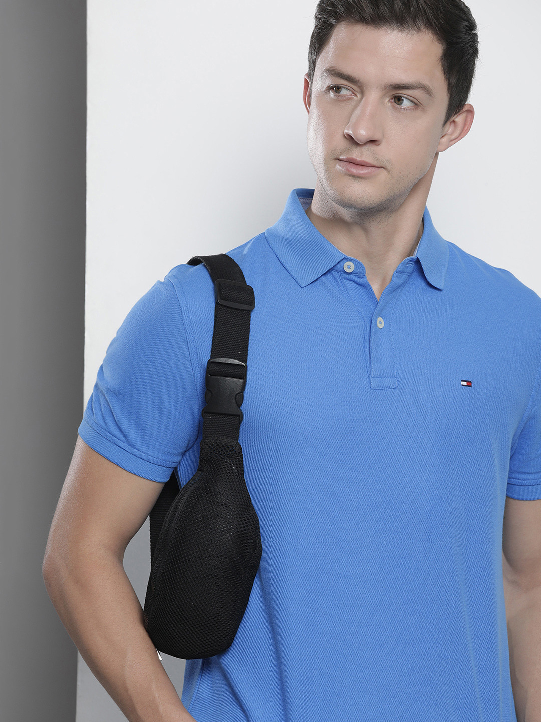 

Tommy Hilfiger Men Blue Solid Polo Collar Pure Cotton T-shirt