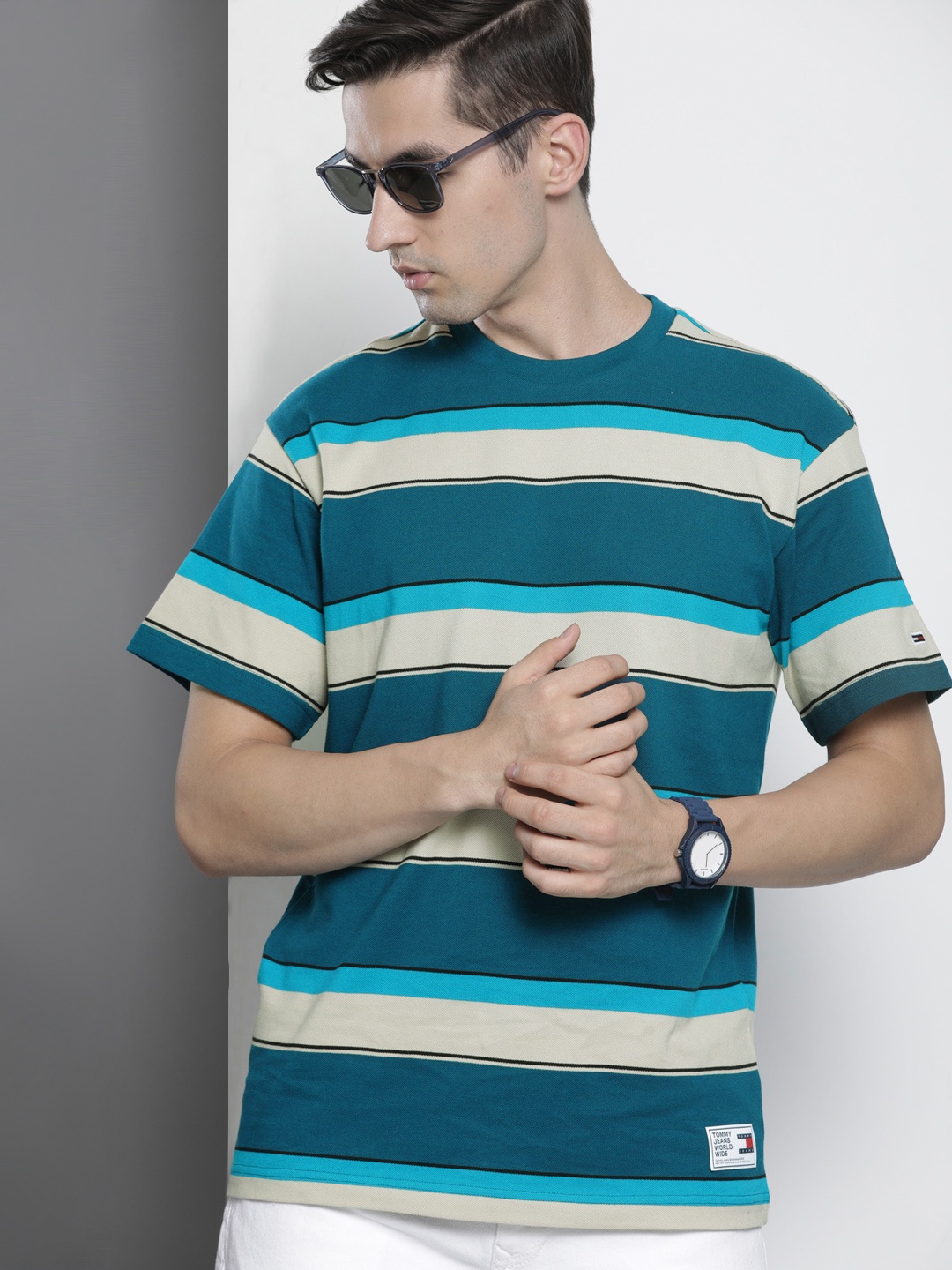 

Tommy Hilfiger Men Teal Blue & Beige Striped Pure Cotton T-shirt