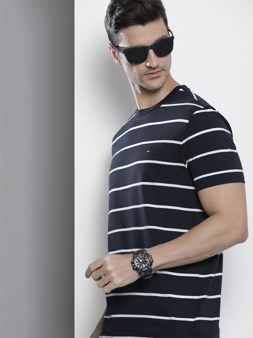 

Tommy Hilfiger Men Navy Blue & White Striped Pure Cotton Casual T-shirt