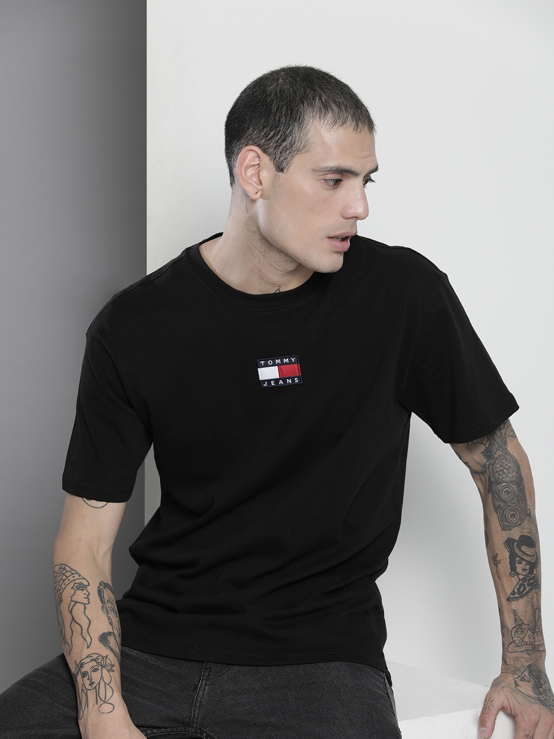 

Tommy Hilfiger Men Black Solid Pure Cotton T-shirt