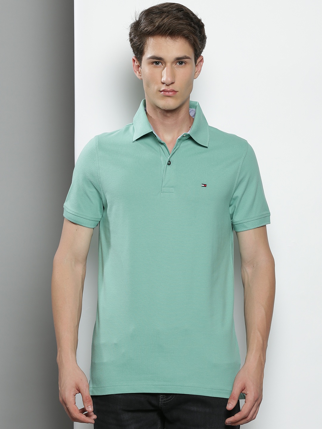 

Tommy Hilfiger Men Green Solid Polo Collar Slim Fit T-shirt