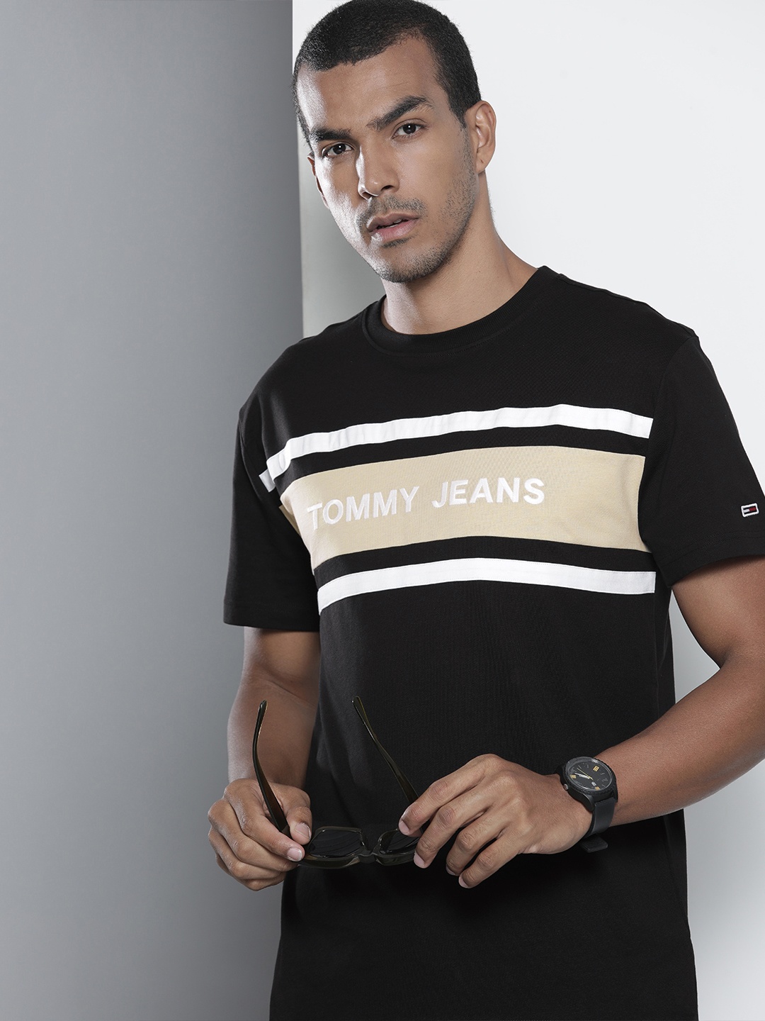 

Tommy Hilfiger Men Black & Beige Striped Pure Cotton T-shirt