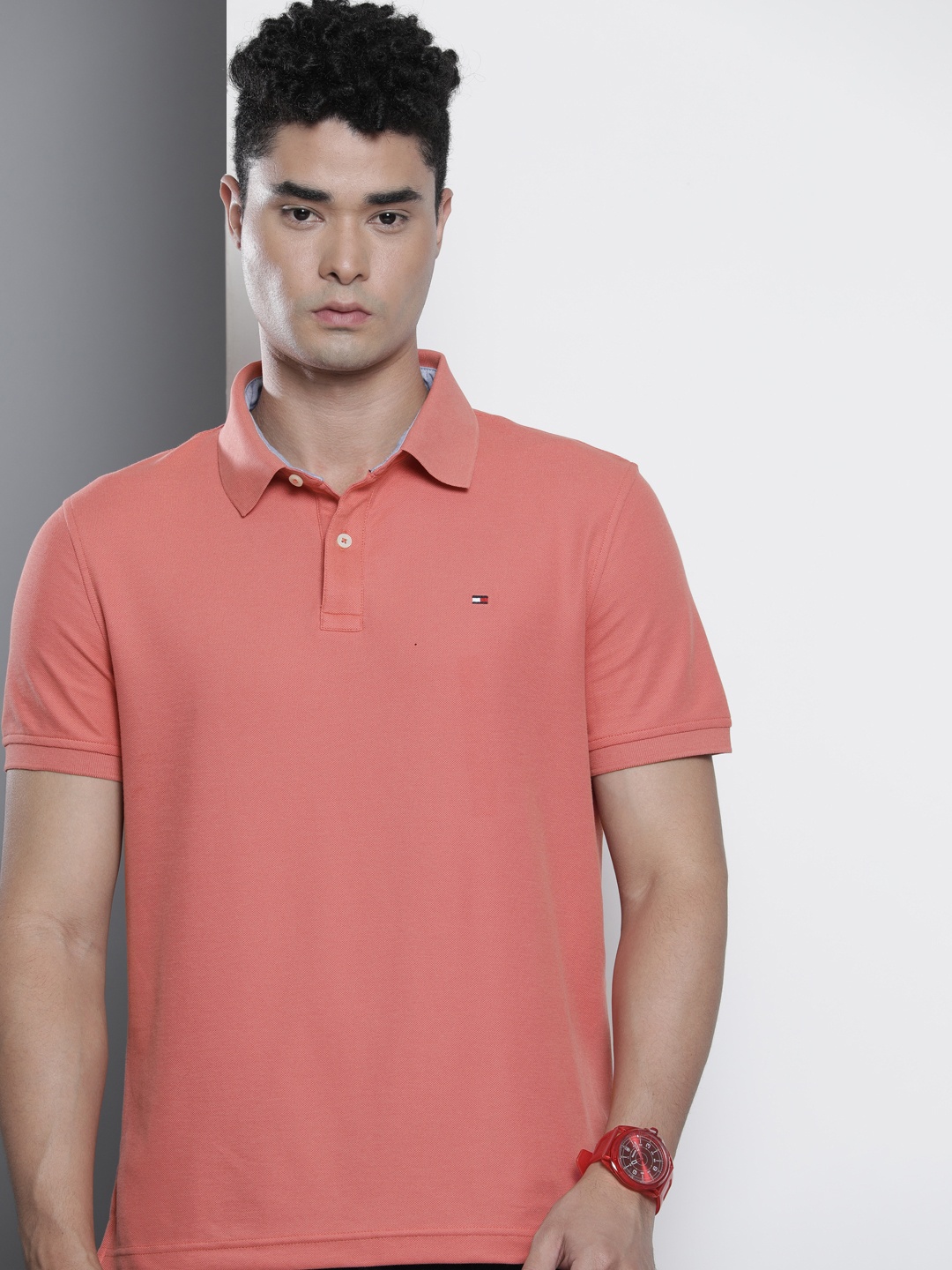 

Tommy Hilfiger Men Coral Pink Polo Collar T-shirt