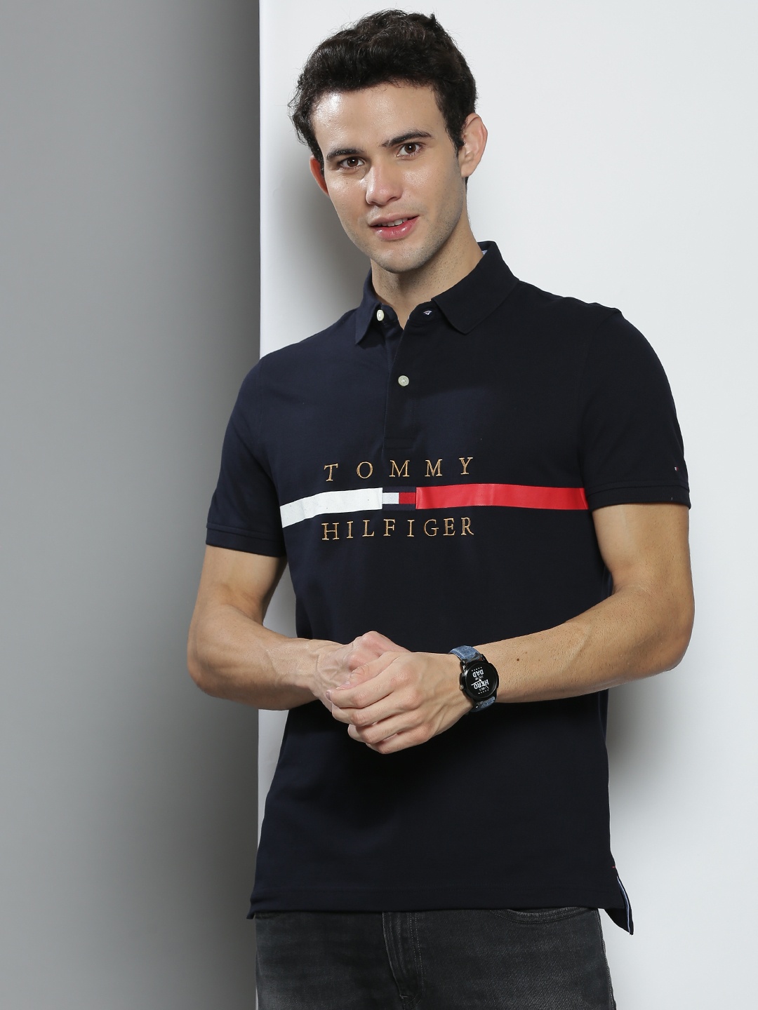 

Tommy Hilfiger Men Navy Blue & Beige Brand Logo Polo Collar T-shirt