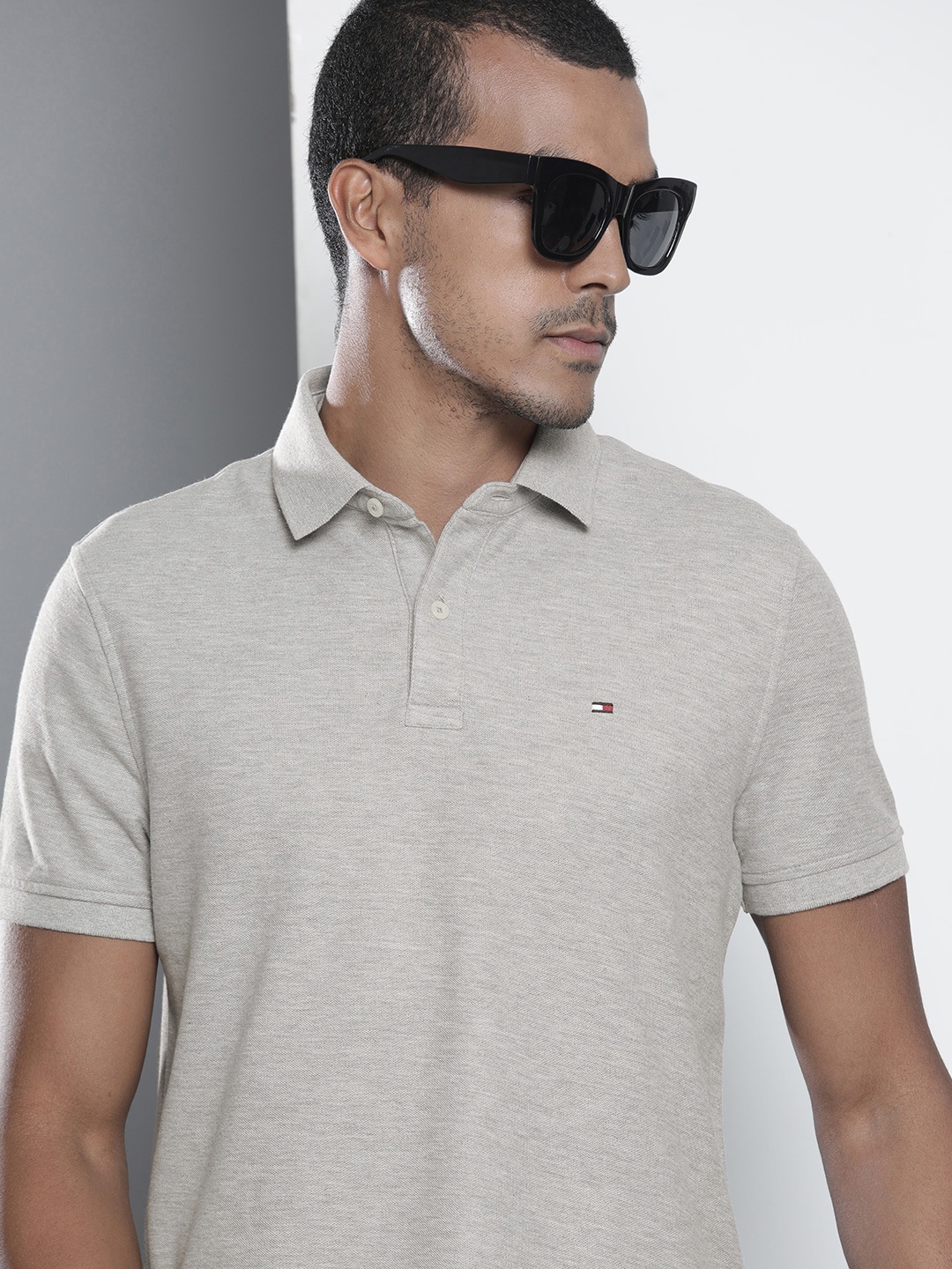 

Tommy Hilfiger Men Grey Solid Polo Collar Casual T-shirt