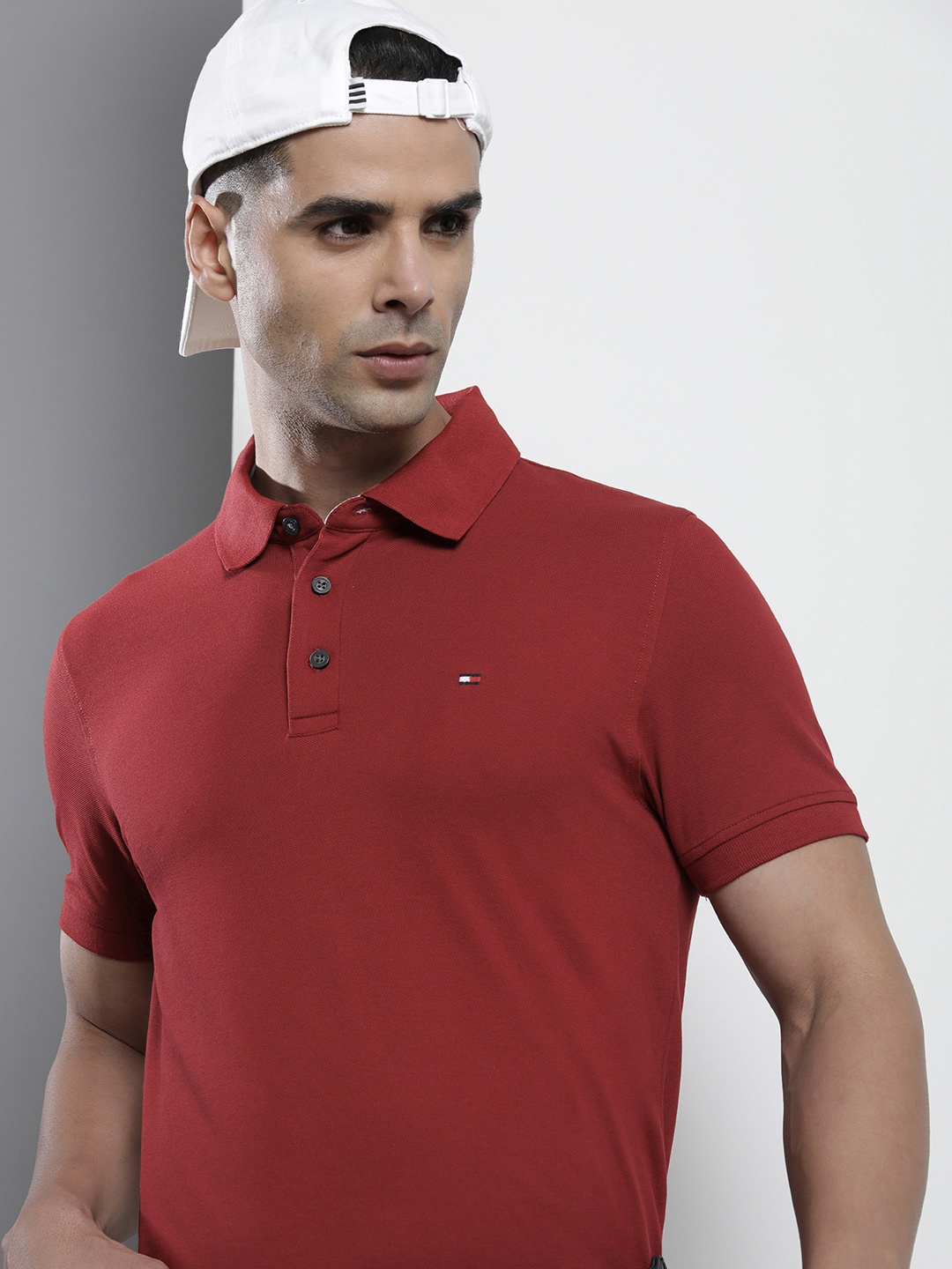 

Tommy Hilfiger Men Maroon Solid Polo Collar Slim Fit T-shirt