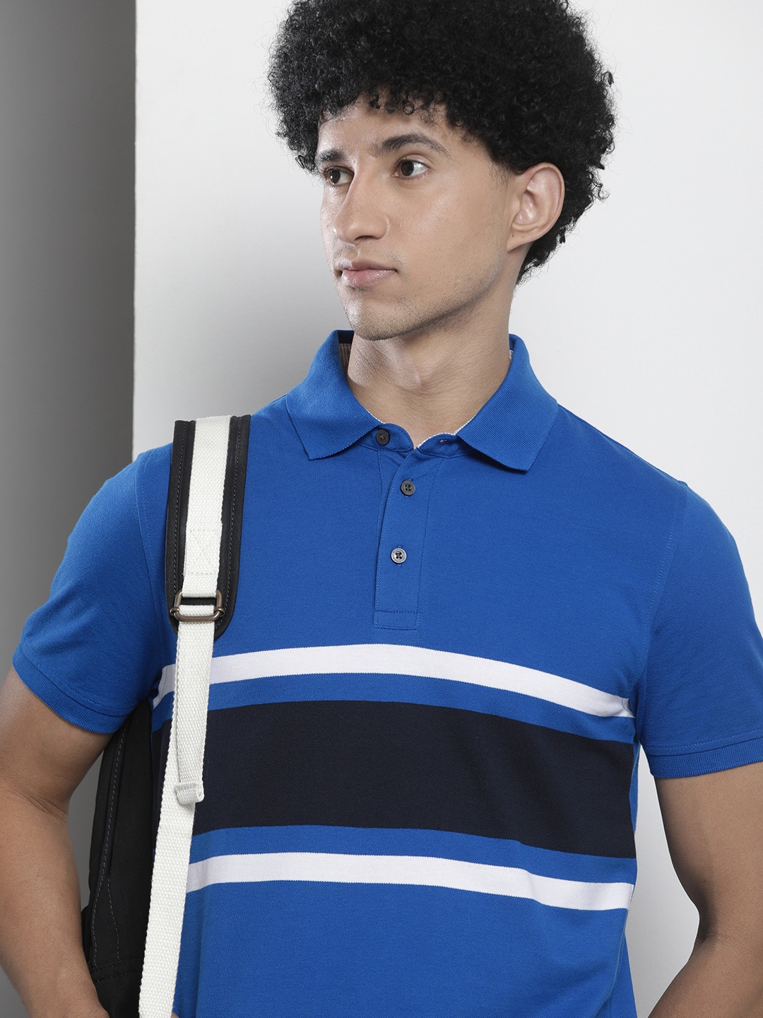 

Tommy Hilfiger Men Blue & Navy Blue Striped Polo Collar Slim Fit T-shirt