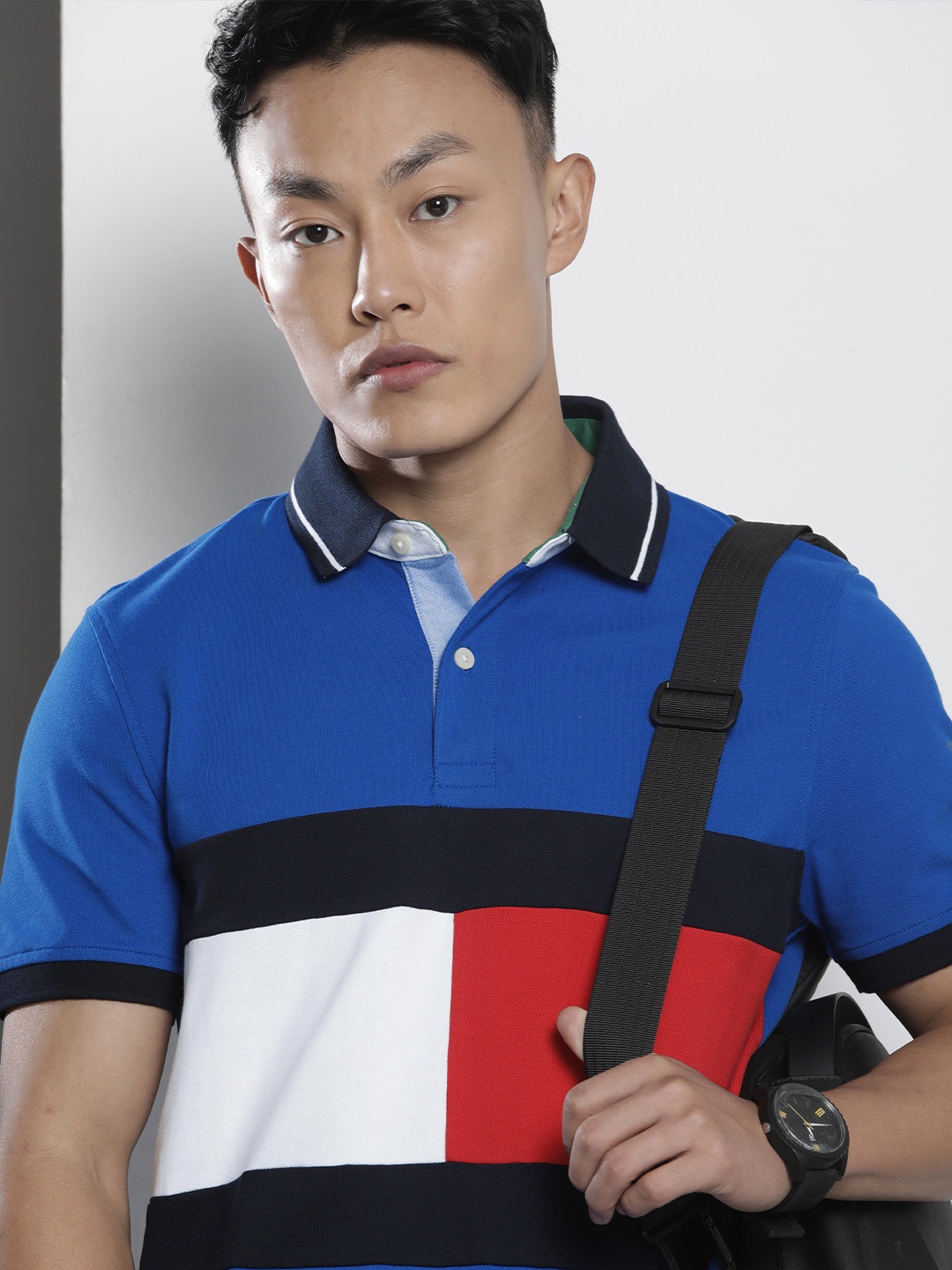 

Tommy Hilfiger Men Blue & Black Colourblocked Polo Collar Casual T-shirt