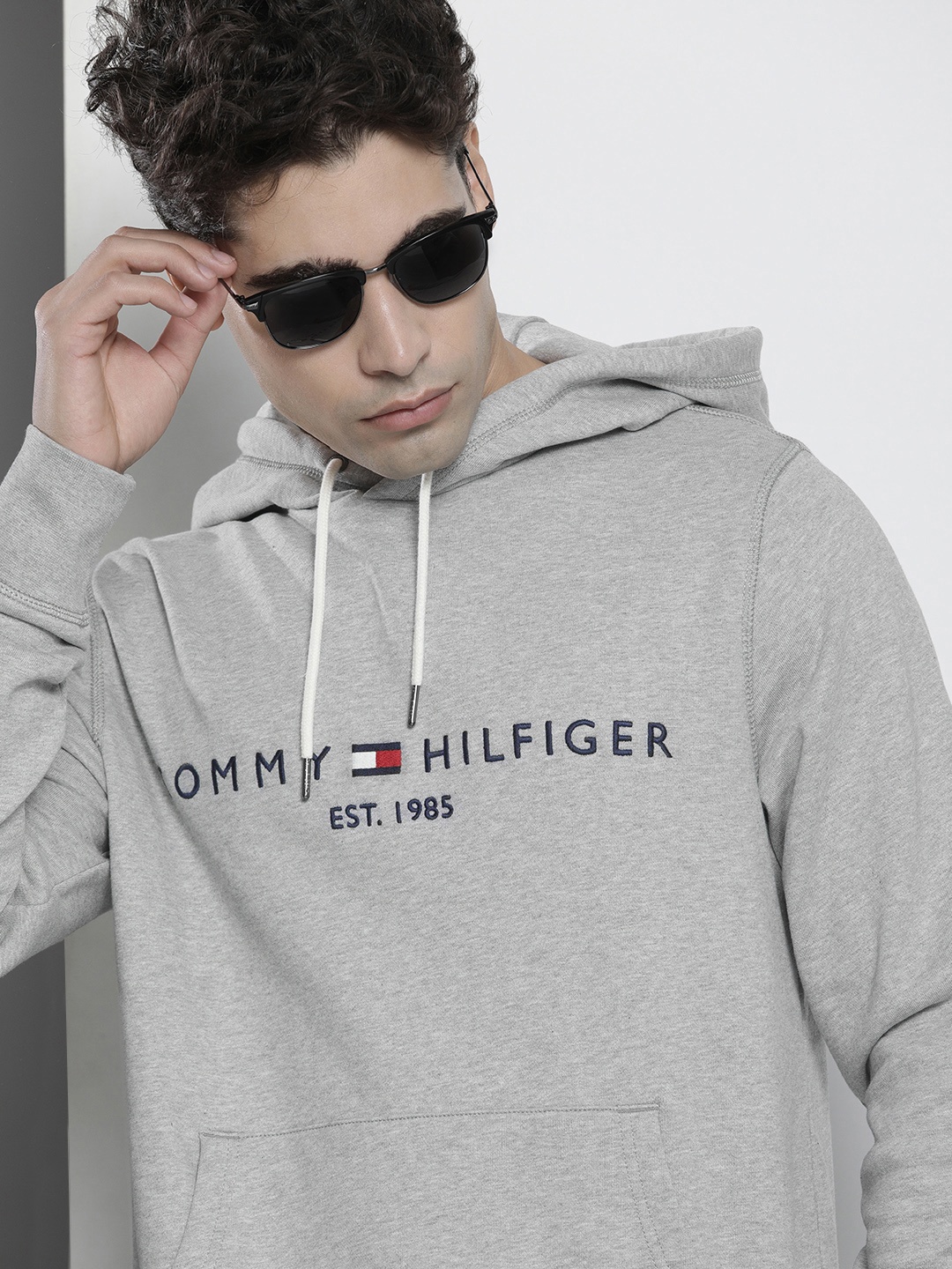 

Tommy Hilfiger Men Grey Melange & Navy Blue Embroidered Hooded Sweatshirt