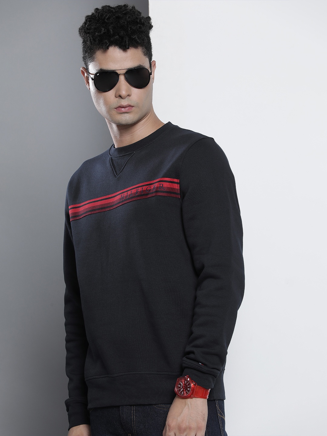 

Tommy Hilfiger Men Navy Blue & Red Striped Sweatshirt