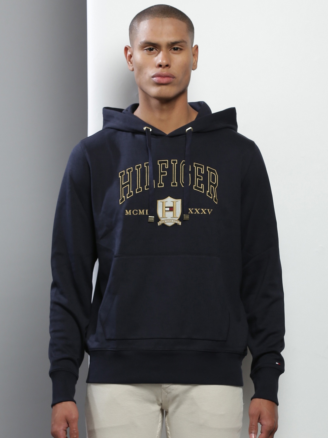 

Tommy Hilfiger Men Navy Blue & Yellow Cotton Embroidered Hooded Sweatshirt