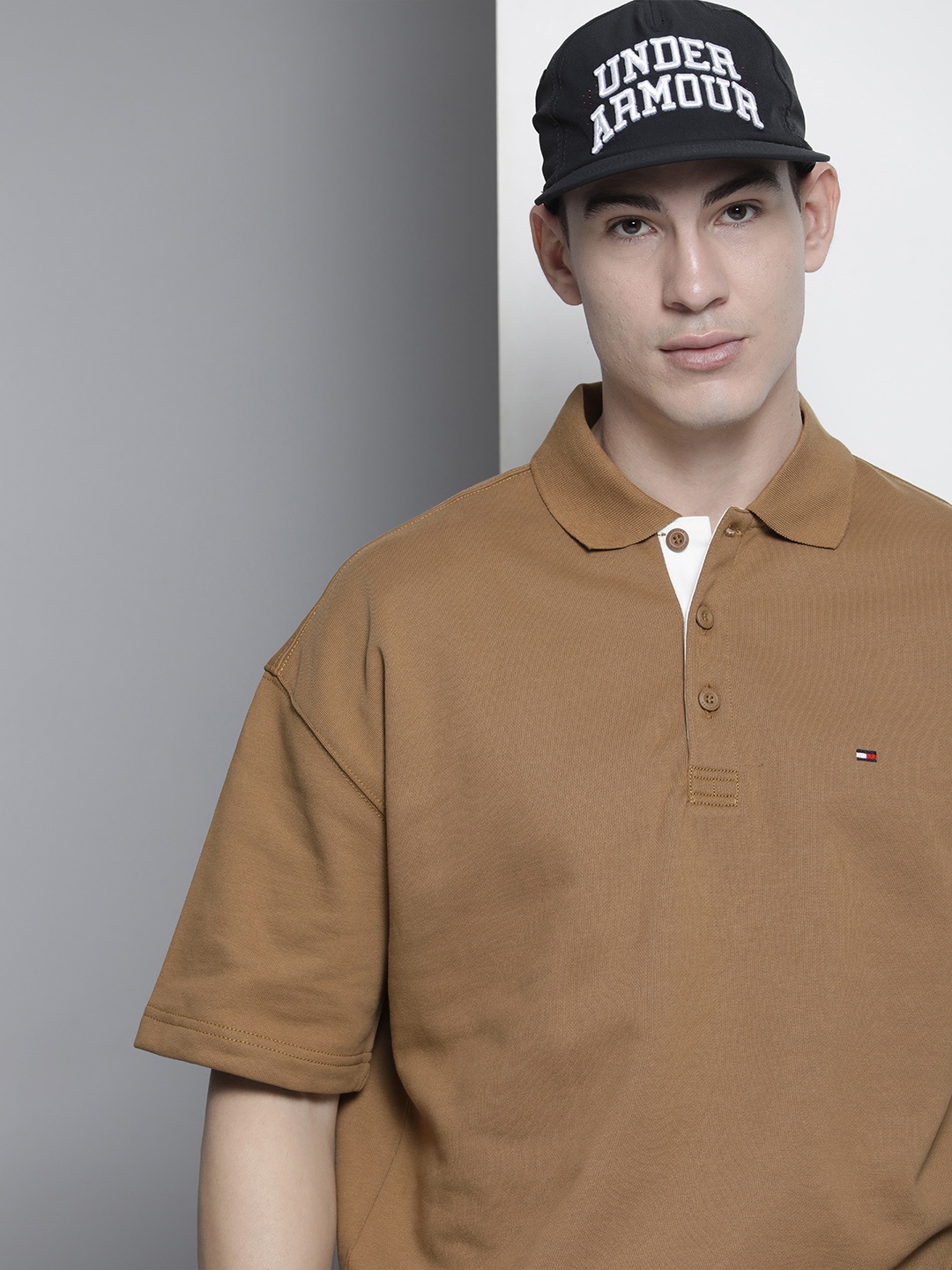 

Tommy Hilfiger Men Khaki Solid Organic Cotton Sweatshirt