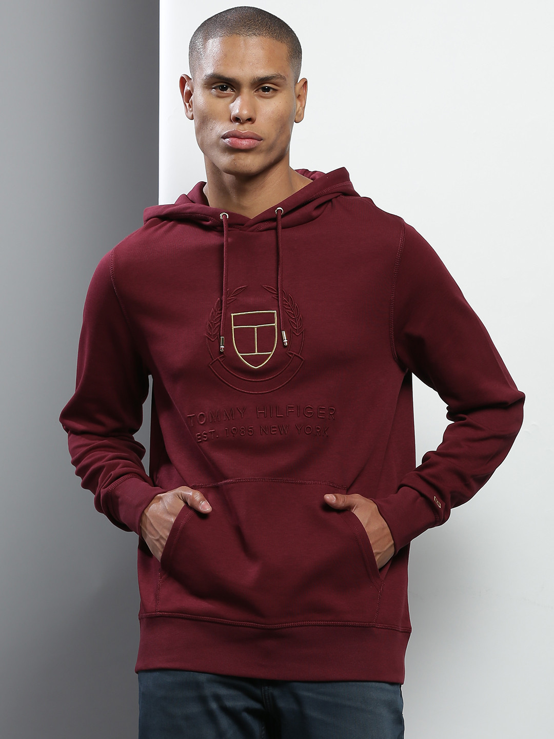 

Tommy Hilfiger Men Maroon Embroidered Solid Hooded Sweatshirt