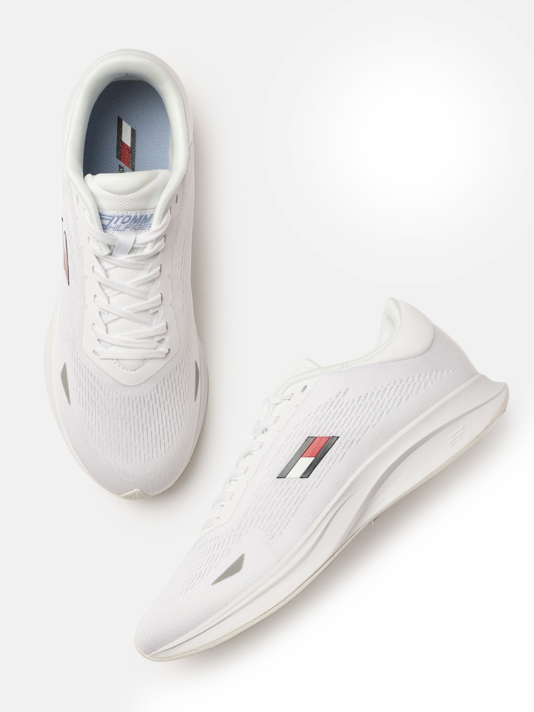 

Tommy Hilfiger Women White Textured Sleek 3 Regular Sneakers with Tech Foam Pro Midsole