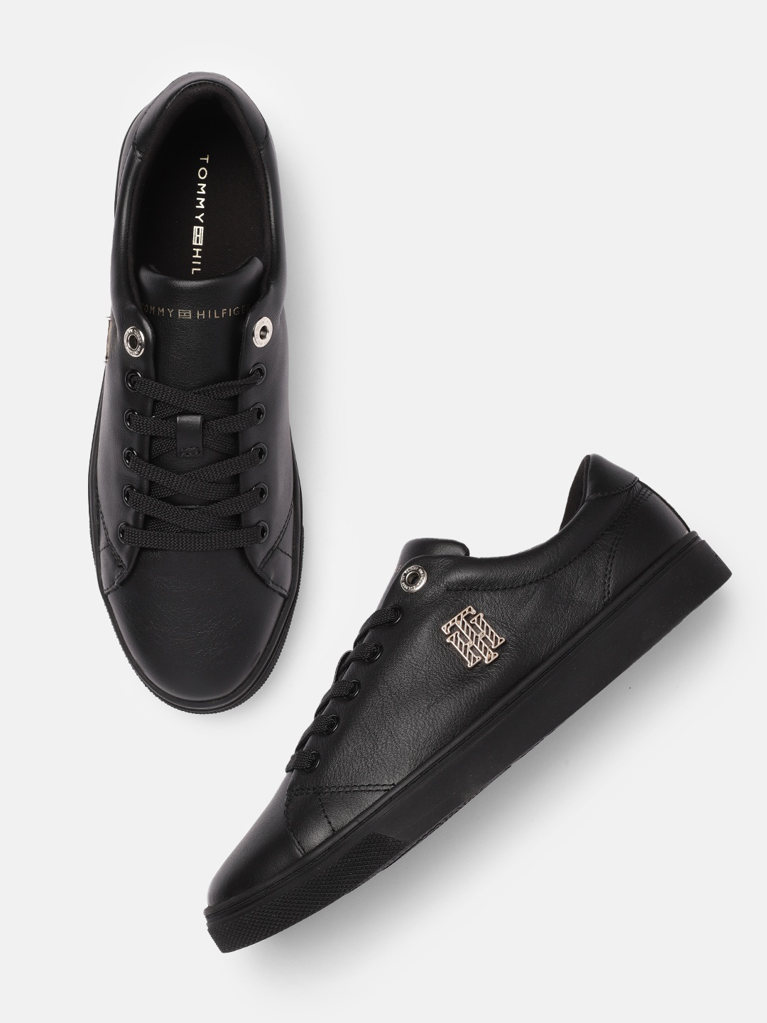 

Tommy Hilfiger Women Black Solid Leather Regular Sneakers With Brand Logo Applique Detail