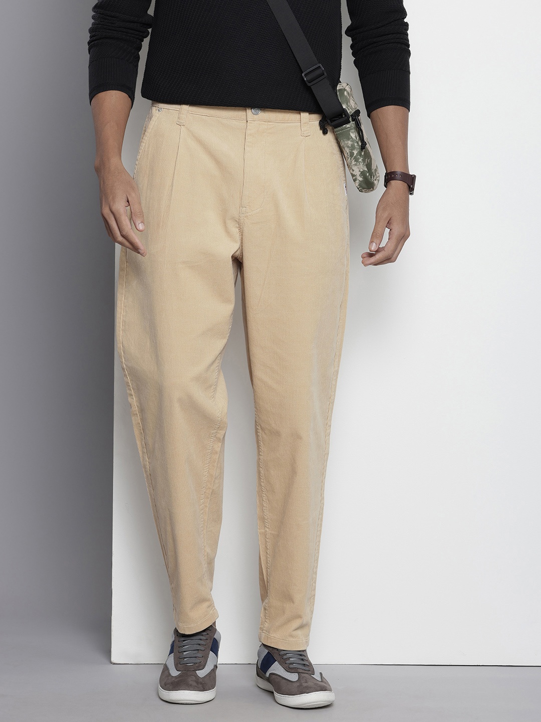 

Tommy Hilfiger Men Loose Tapered Fit Corduroy Chinos Trousers, Beige
