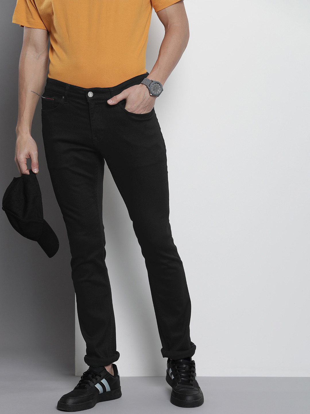 

Tommy Hilfiger Men Mid-Rise Scanton Slim Fit Stretchable Jeans, Black