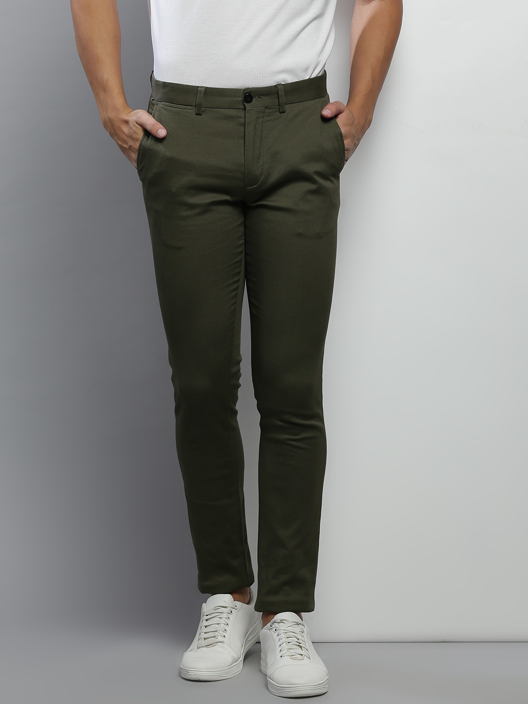 

Tommy Hilfiger Men Olive Green Solid Cotton Slim Fit Trousers