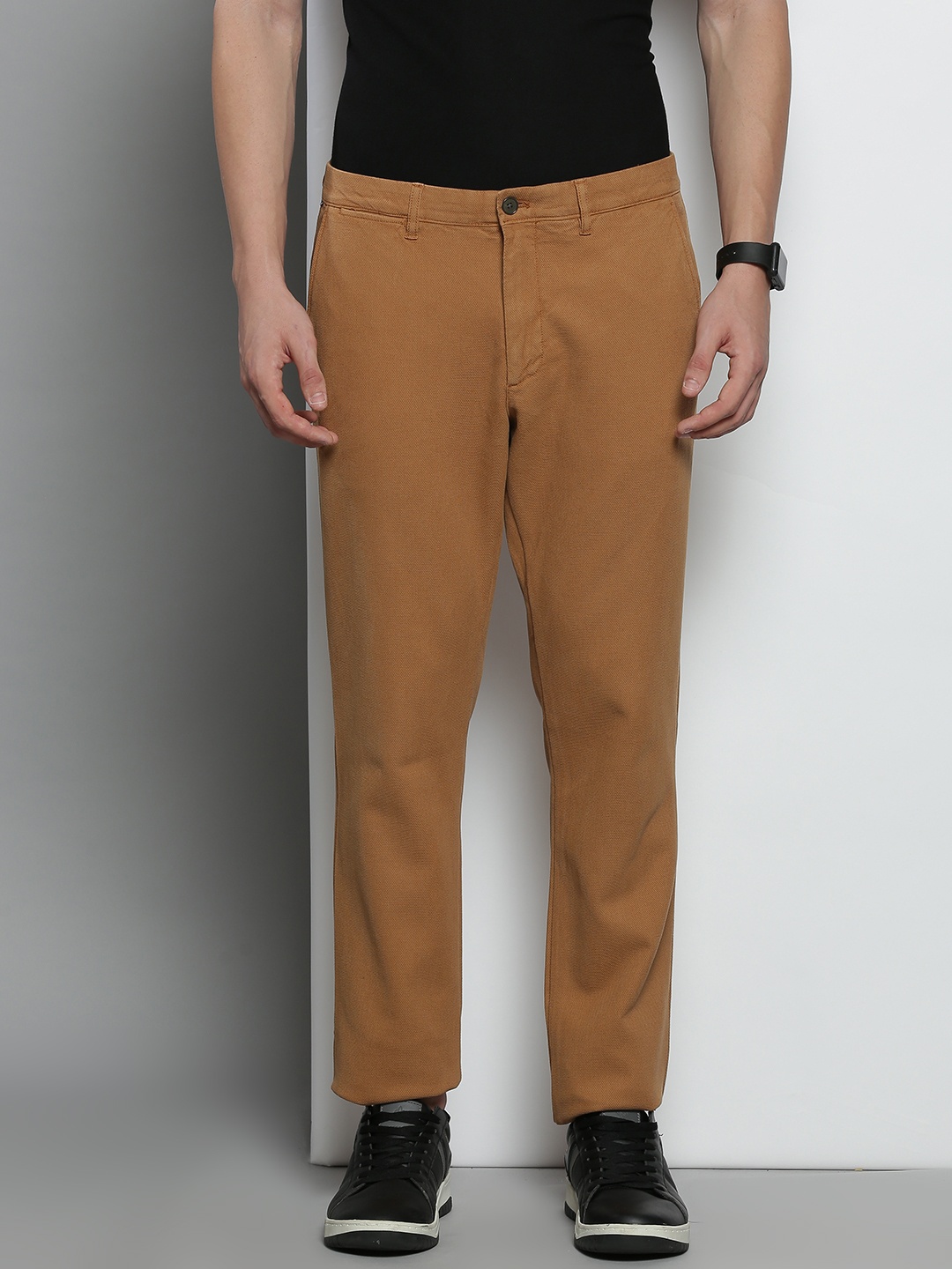 

Tommy Hilfiger Men Khaki Solid Chinos