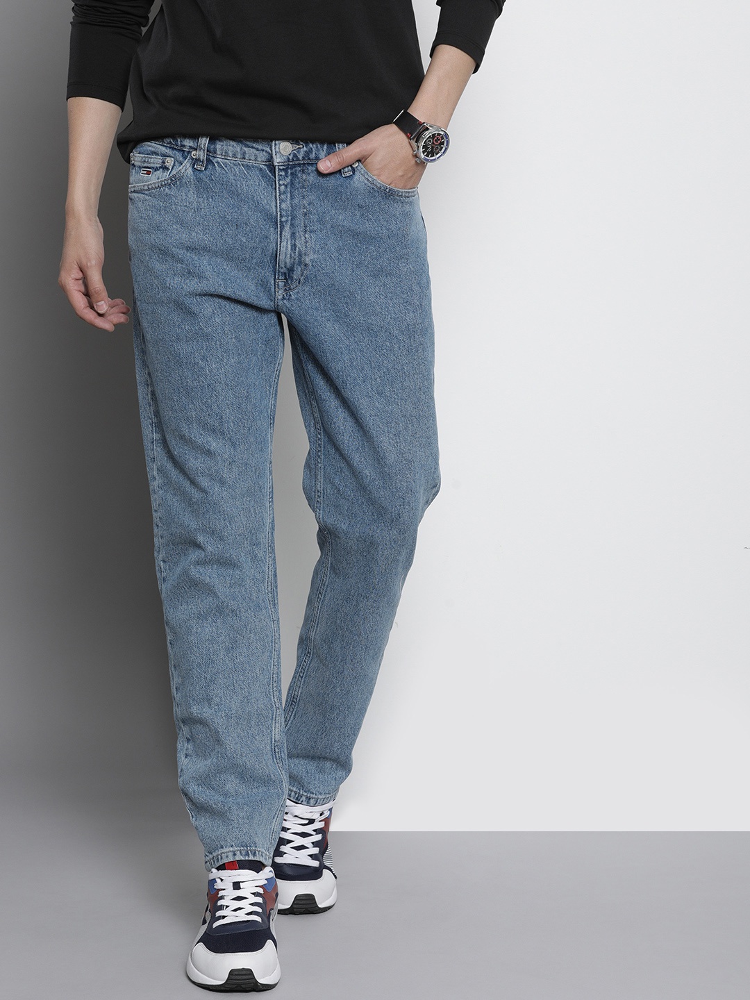 

Tommy Hilfiger Men Blue Tapered Fit Mid Rise Stretchable Jeans