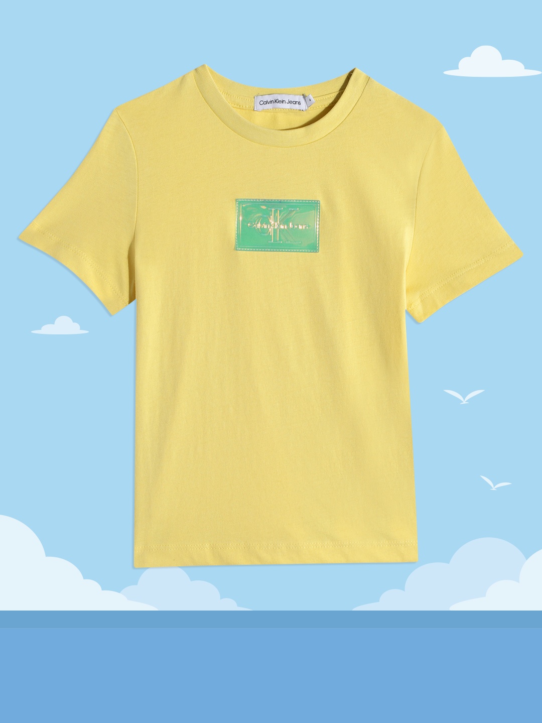 

Calvin Klein Jeans Boys Yellow Solid Pure Cotton T-shirt With Iridescent Applique