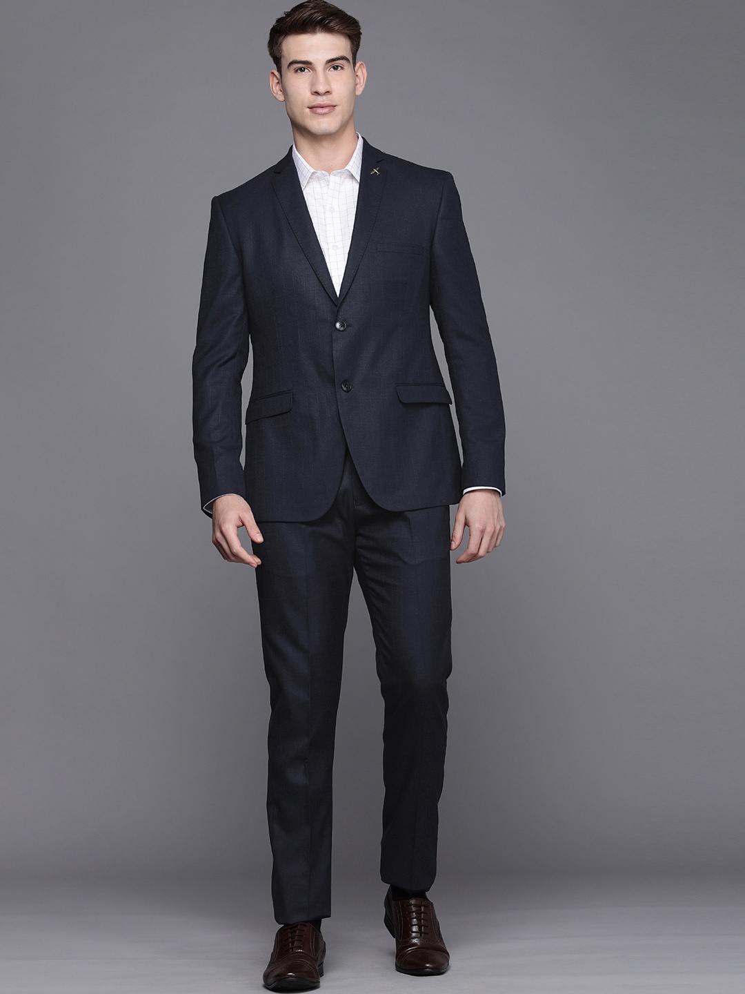 

Theme Men Navy Blue Checked Slim Fit Two Piece Suit