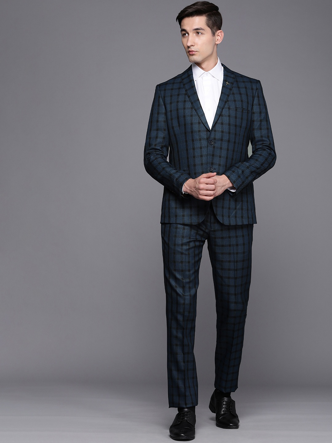 

Theme Men Navy Blue Checked Slim Fit Two Piece Suit