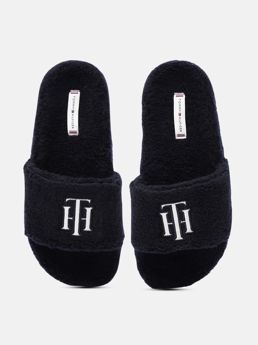 

Tommy Hilfiger Women Navy Blue Solid Sliders