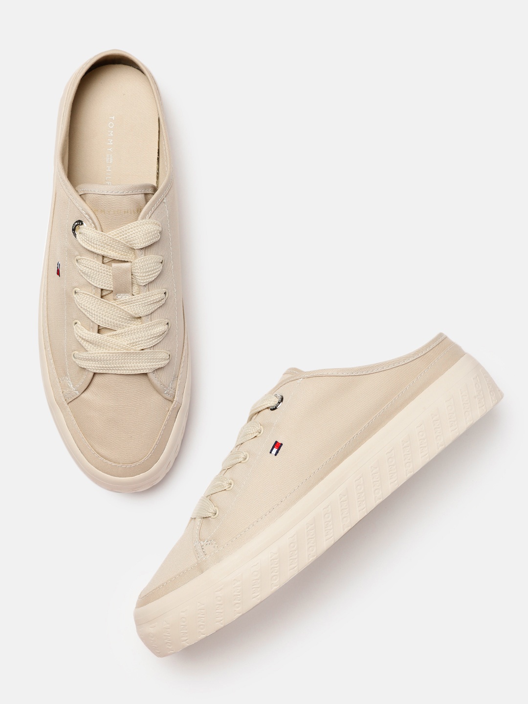 

Tommy Hilfiger Women Beige Solid Mules