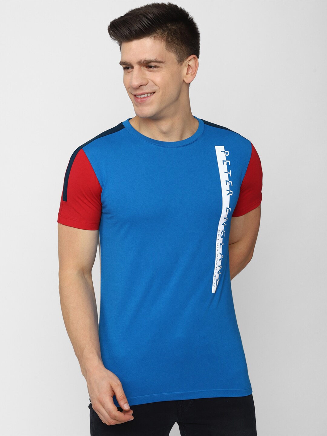 

Peter England Casuals Men Blue Colourblocked Applique Slim Fit T-shirt