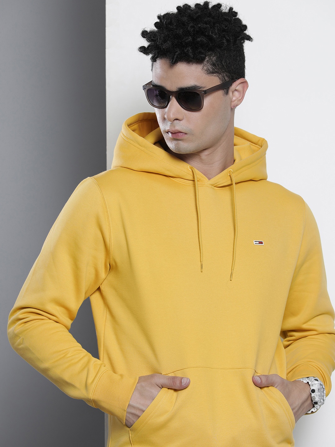

Tommy Hilfiger Men Yellow Solid Hooded Sweatshirt