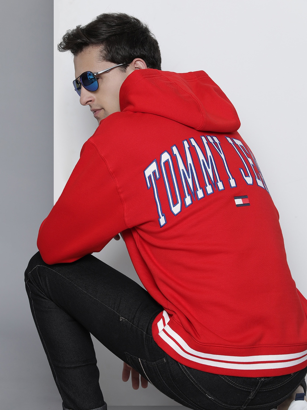 

Tommy Hilfiger Men Red Solid Hooded Sweatshirt